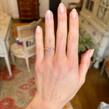 Padparascha sapphire and diamond three-stone engagement ring