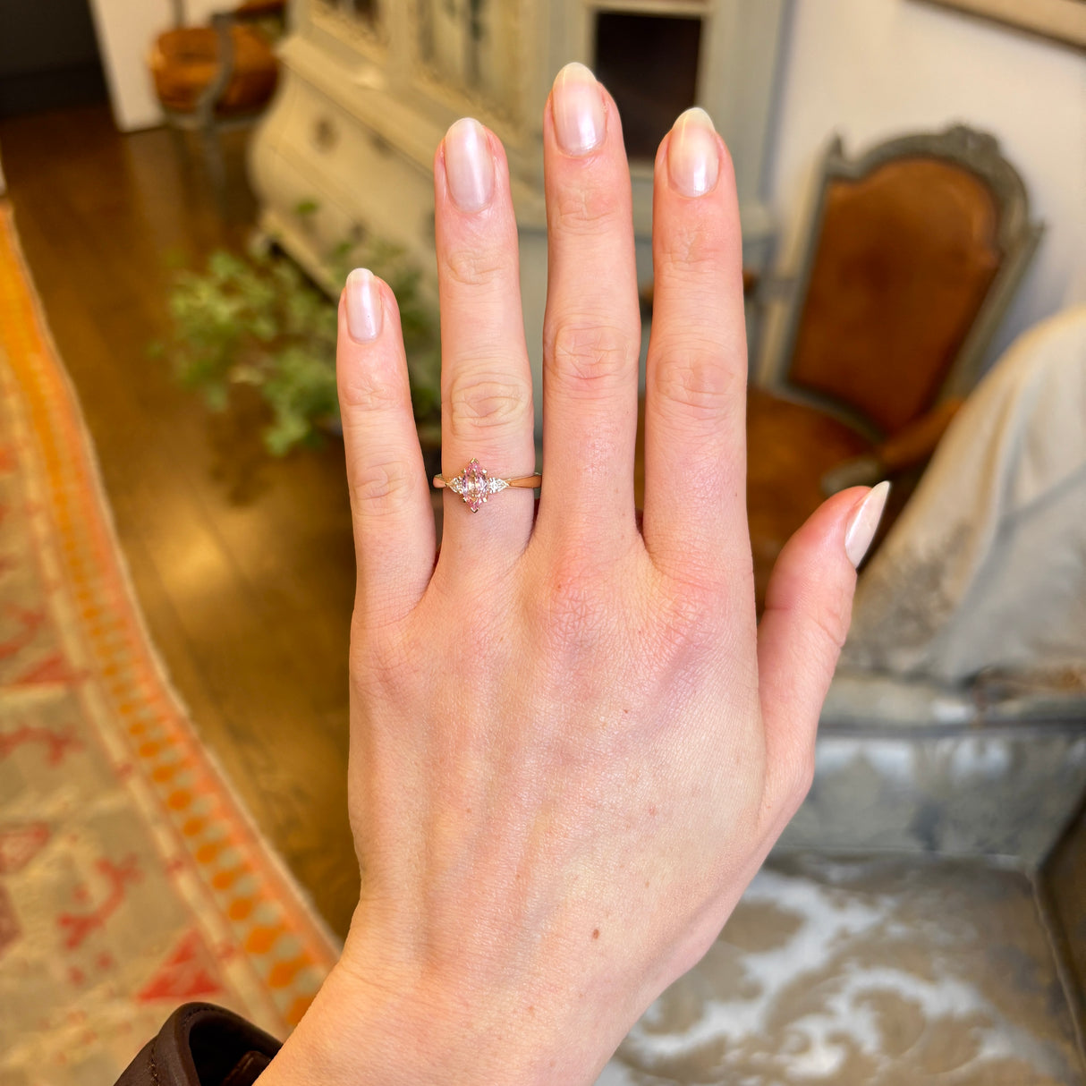 Marquise-cut Padparascha Pink sapphire and diamond three-stone engagement ring