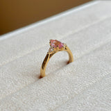 Marquise-cut Padparascha Pink sapphire and diamond three-stone engagement ring