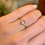 Marquise-cut Padparascha Pink sapphire and diamond three-stone engagement ring