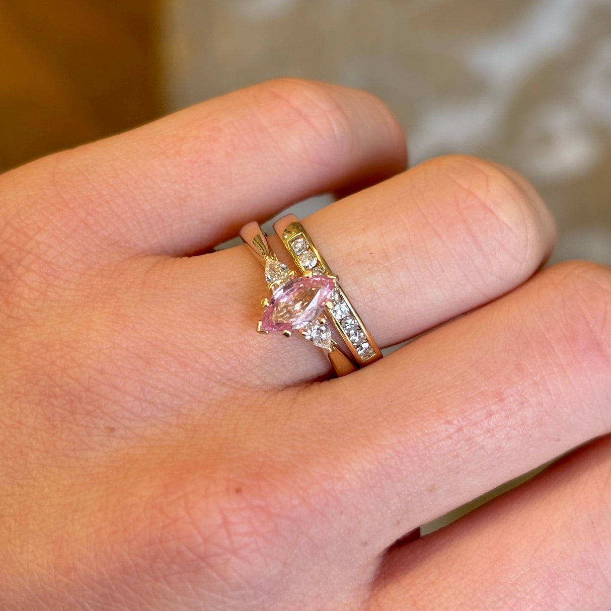 Marquise-cut Padparascha Pink sapphire and diamond three-stone engagement ring