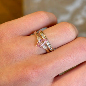 Blush-pink and apricot-orange sapphire three-Stone engagement ring