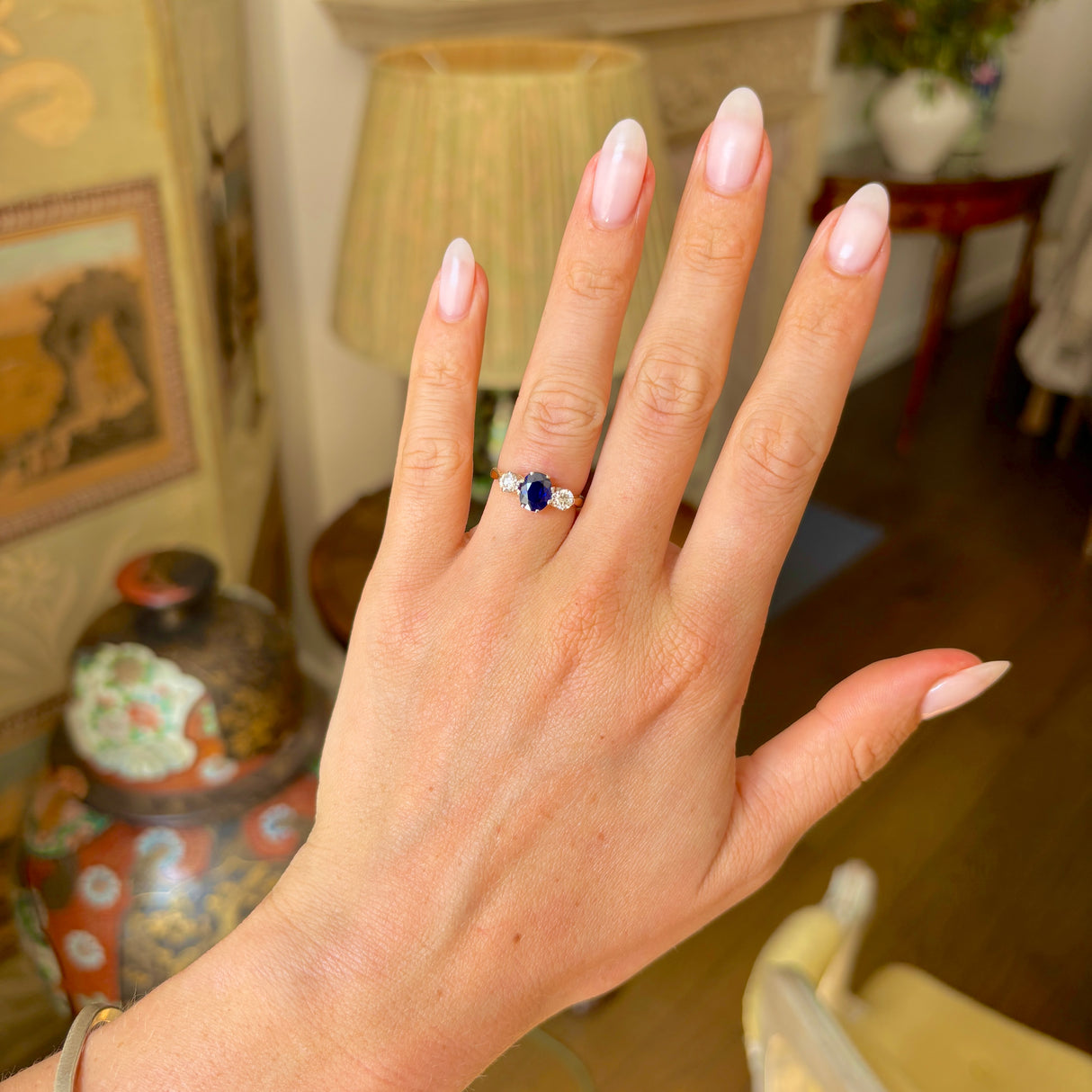  Antique, Edwardian three-stone sapphire & diamond ring