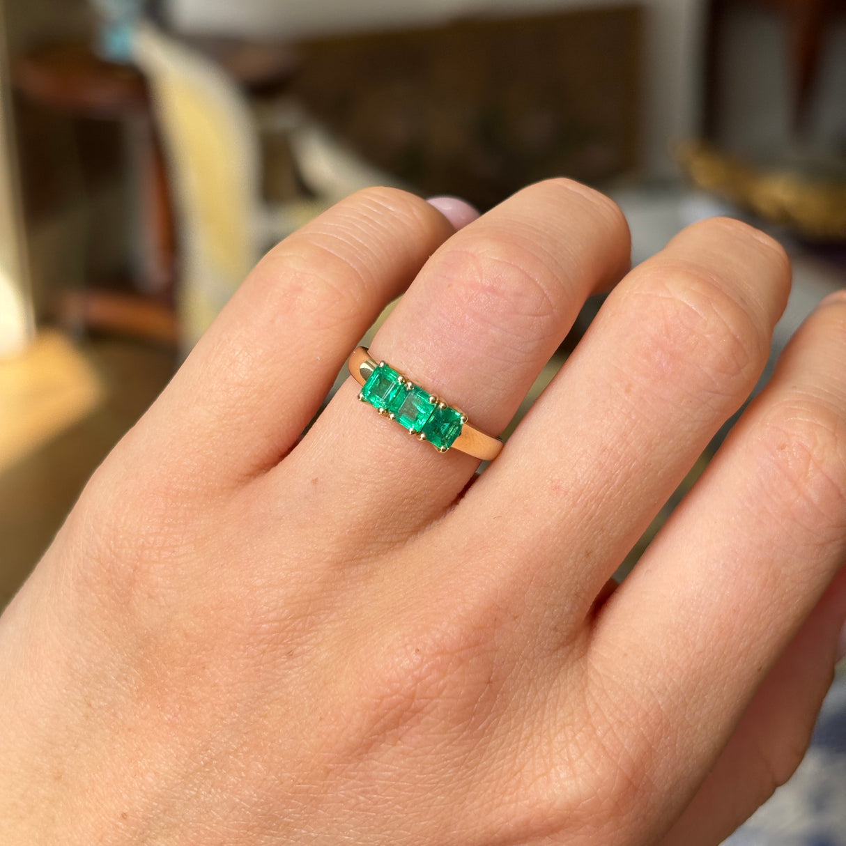 Vintage, 1990s three-stone emerald ring