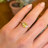 Yellow sapphire and diamond three-stone ring
