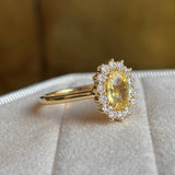 Yellow Sapphire and Diamond Cluster Engagement Ring