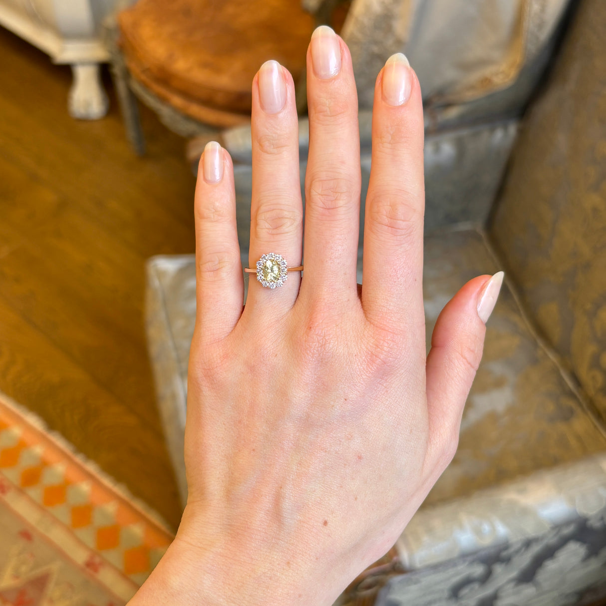 Yellow sapphire and diamond cluster engagement ring