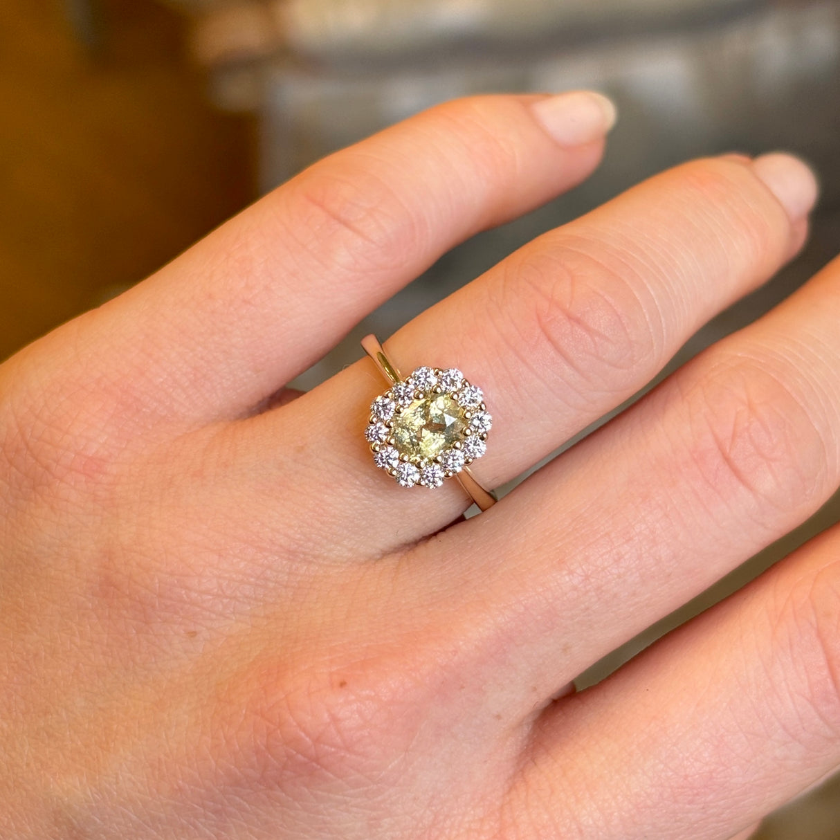 Yellow sapphire and diamond cluster engagement ring