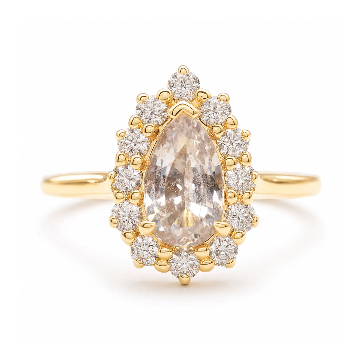 A vintage-inspired, white sapphire and diamond cluster engagement ring set in yellow gold. 