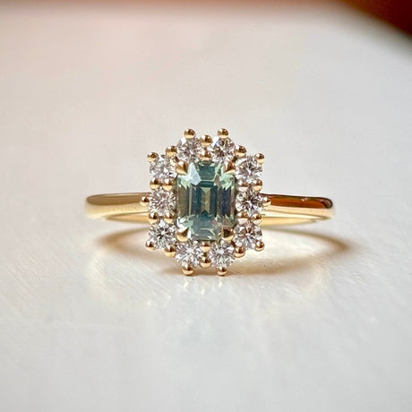 Octagon-cut green sapphire & diamond cluster engagement ring