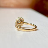Octagon-cut green sapphire & diamond cluster engagement ring