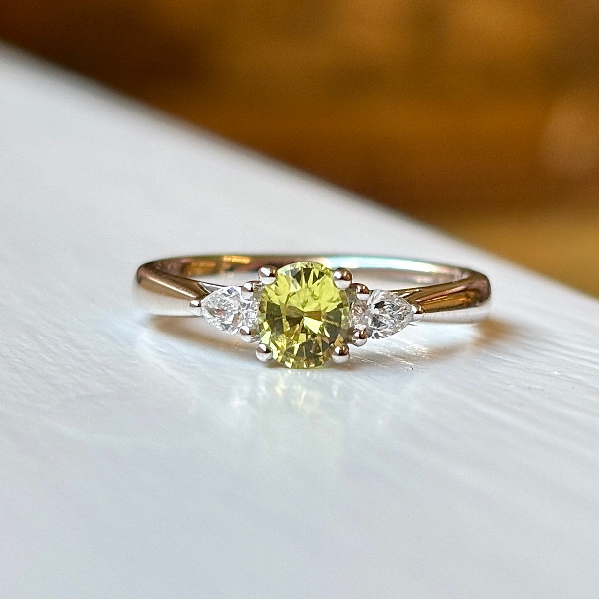 Oval-cut yellow sapphire & diamond three-stone ring