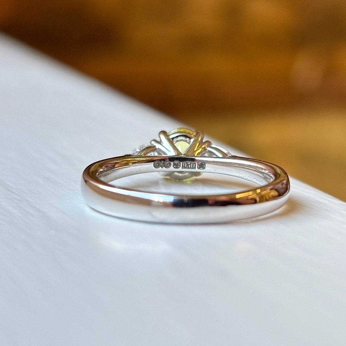 Oval-cut yellow sapphire & diamond three-stone ring