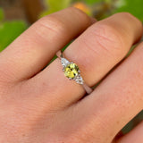 Oval-cut yellow sapphire & diamond three-stone ring