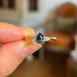 Pear-cut teal sapphire & diamond three-stone ring