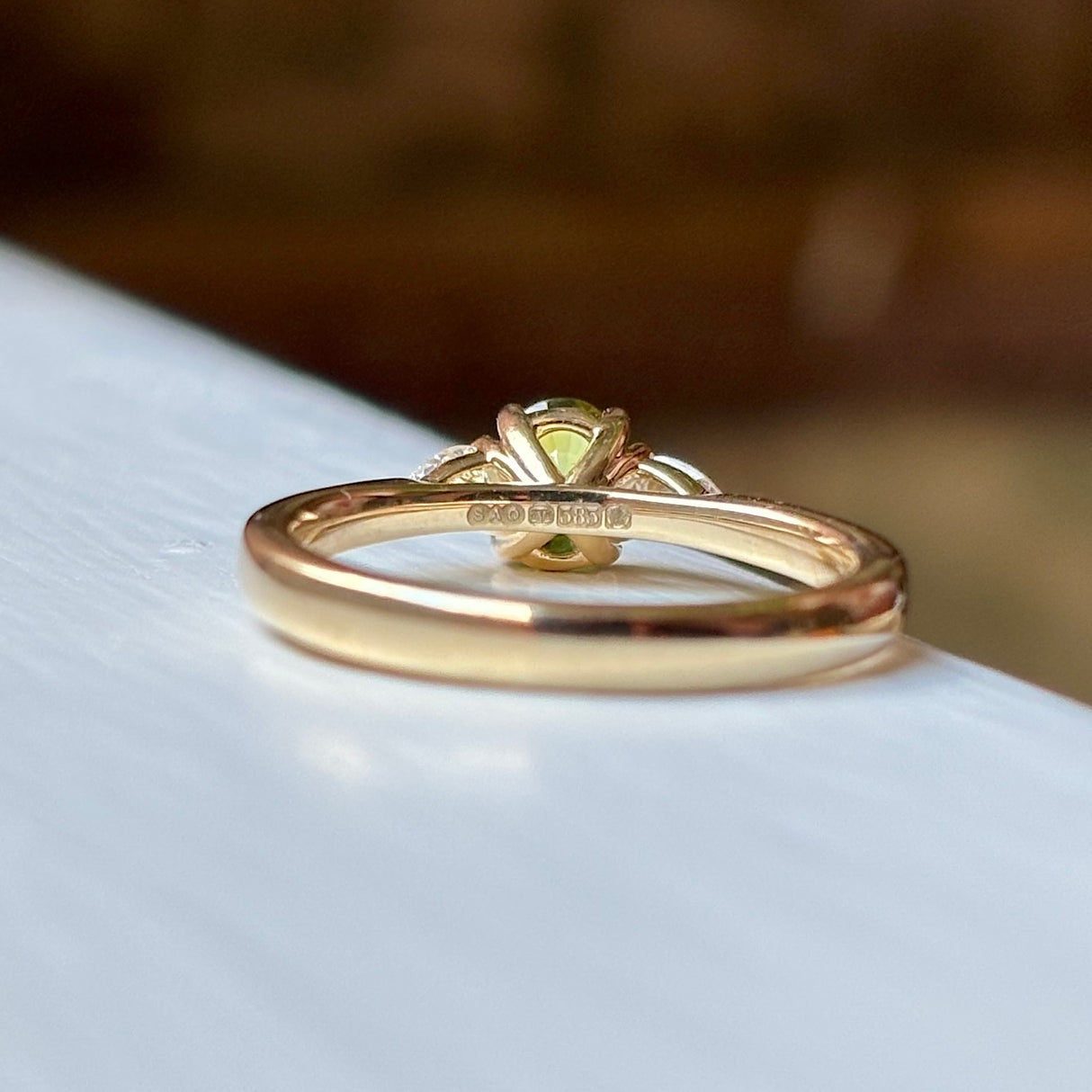 Oval-cut yellow sapphire & diamond three-stone ring