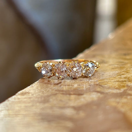 Antique, Edwardian diamond half-hoop ring