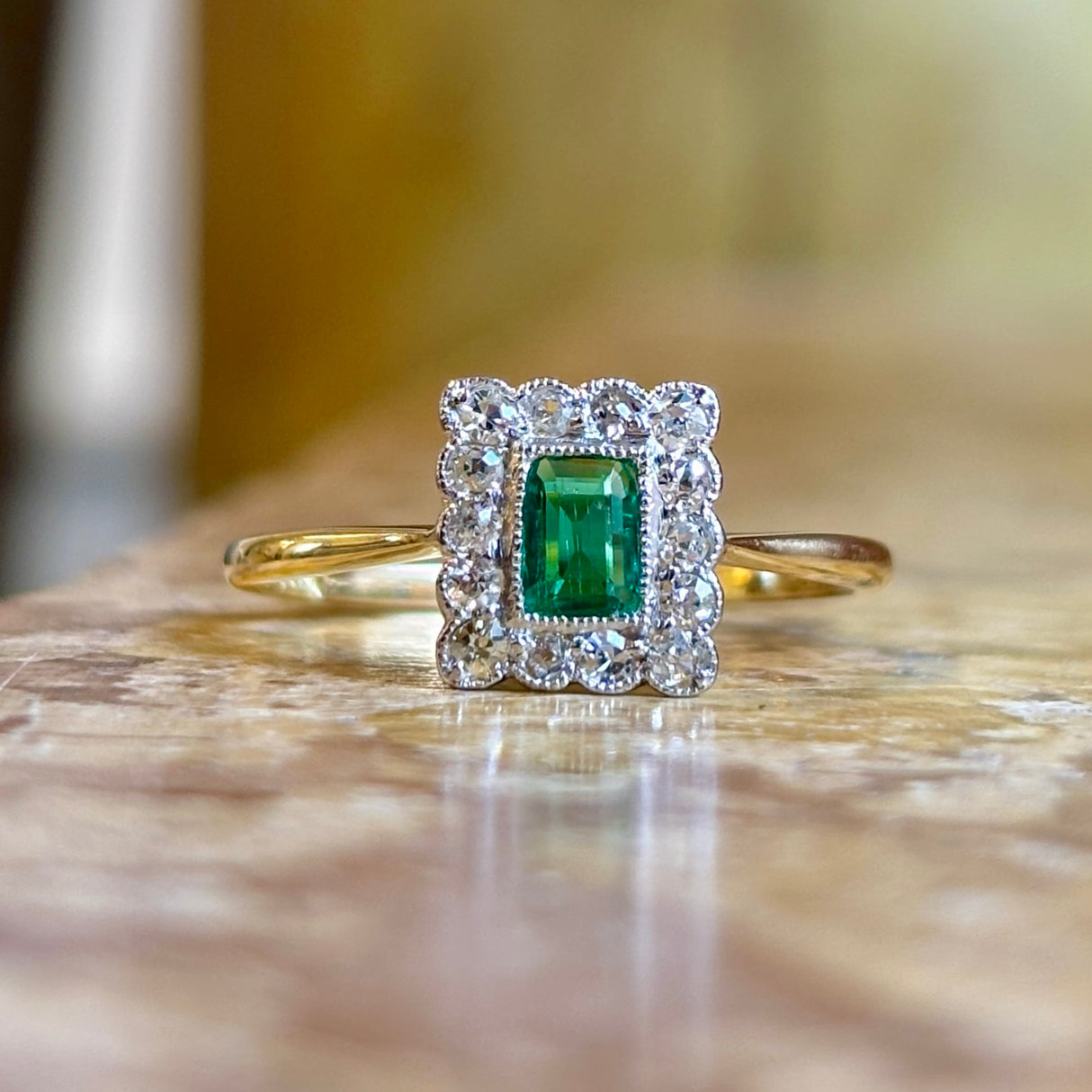 Antique, Edwardian emerald & diamond cluster engagement ring