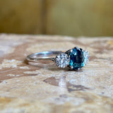 Vintage, 1950s Green-teal sapphire & diamond three-stone ring