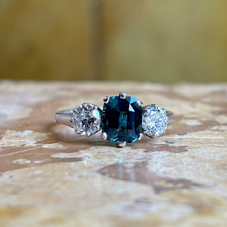 Vintage, 1950s Green-teal sapphire & diamond three-stone ring