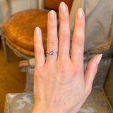 Pink sapphire and diamond three-stone engagement ring