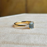 Teal sapphire and diamond three-stone engagement ring
