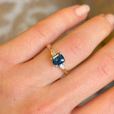 Teal sapphire and diamond three-stone engagement ring