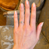 Pear-cut diamond three-stone engagement ring