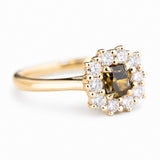 A three-quarter angle of an antique-inspired, Brown diamond halo cluster engagement ring in yellow gold.