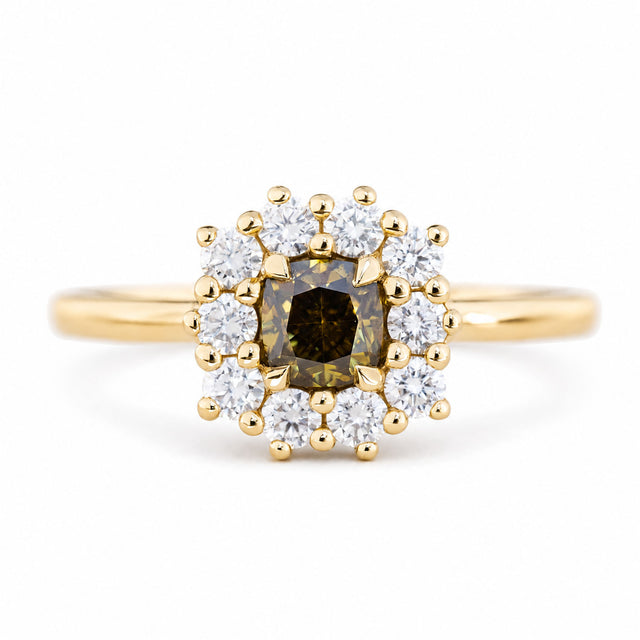 A close-up of an antique-inspired, Brown diamond halo cluster engagement ring in yellow gold.