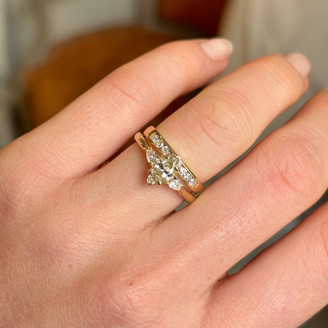 Marquise-cut diamond three-stone engagement ring