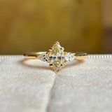 Marquise-cut diamond three-stone engagement ring
