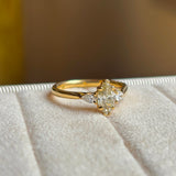 Marquise-cut diamond three-stone engagement ring