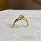 Marquise-cut diamond three-stone engagement ring