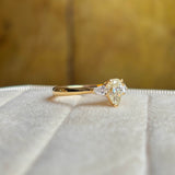 Pear-cut diamond three-stone engagement ring