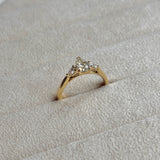 Pear-cut diamond three-stone engagement ring