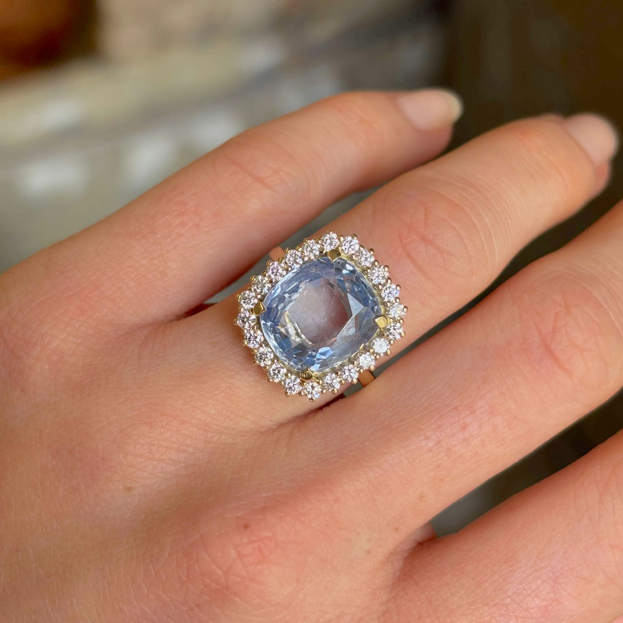 Blue Sapphire and Diamond Cluster Engagement Ring