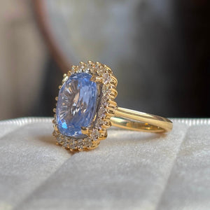 8ct old cushion-cut cornflower blue sapphire and diamond cluster ring