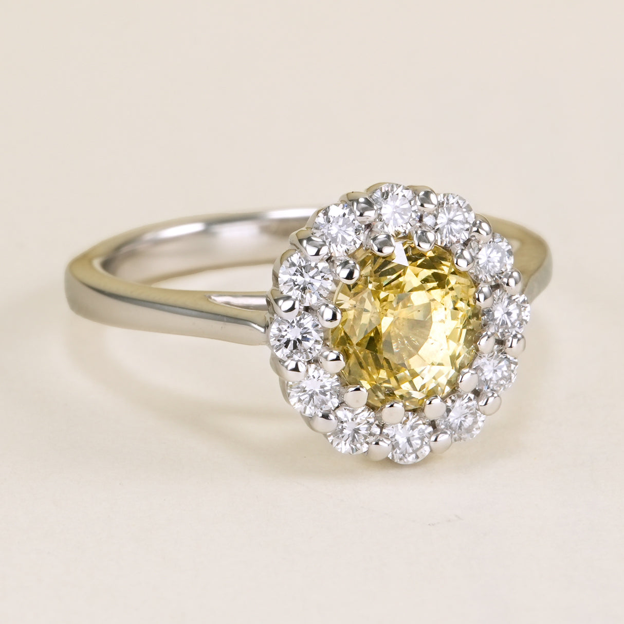 Oval-cut yellow sapphire & diamond cluster ring
