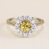 Oval-cut yellow sapphire & diamond cluster ring