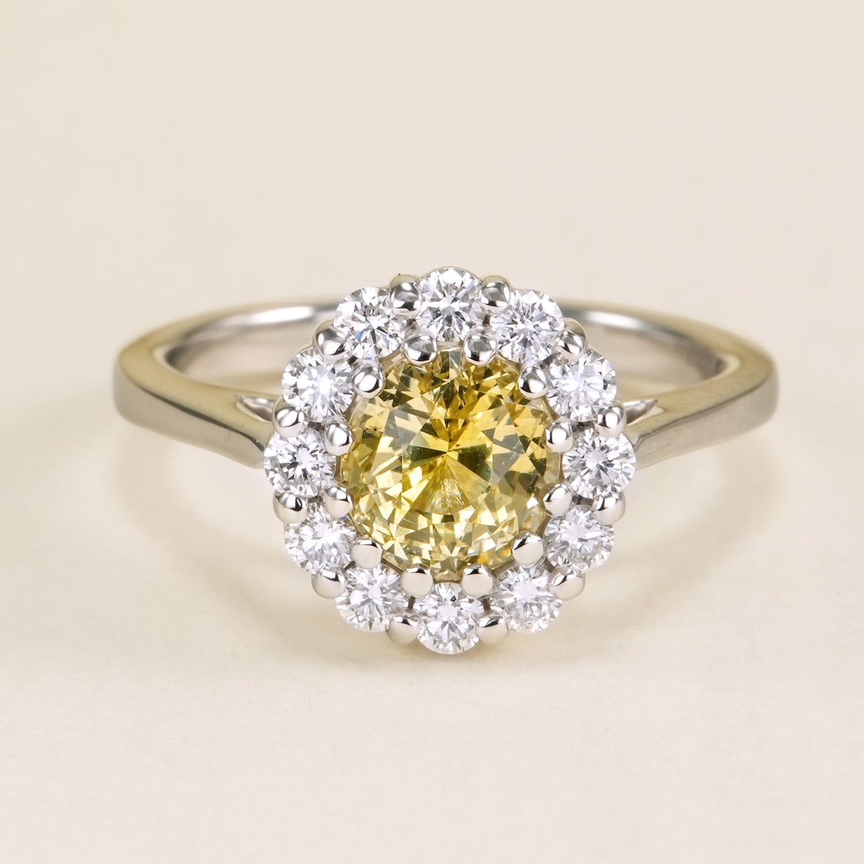 Oval-cut yellow sapphire & diamond cluster ring