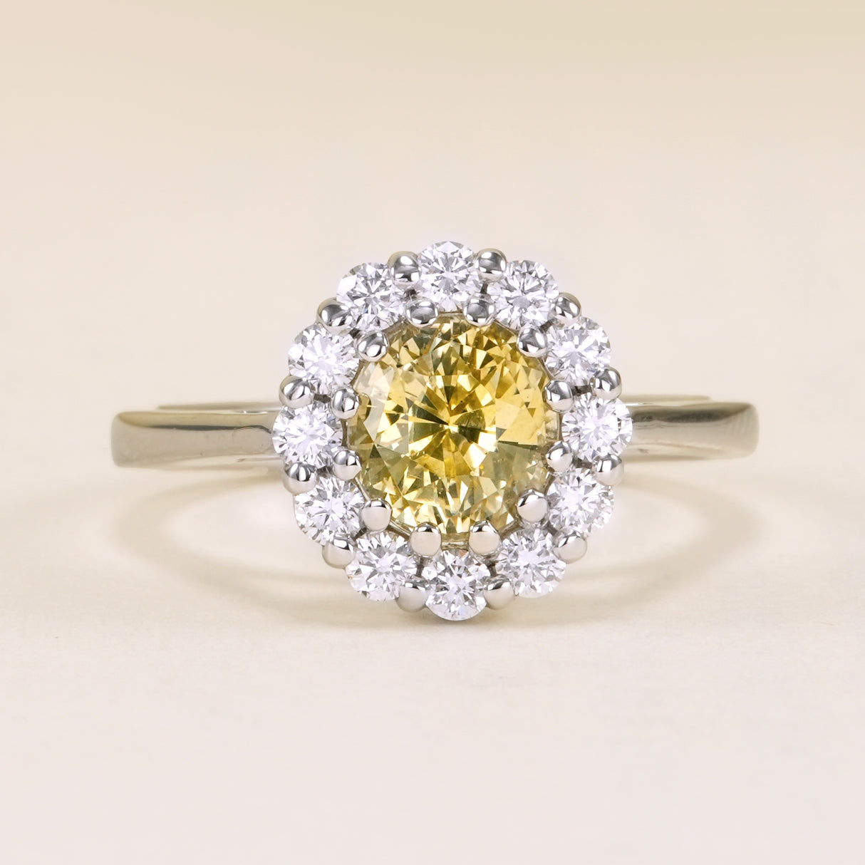 Oval-cut yellow sapphire & diamond cluster ring
