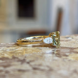 Emerald-cut yellow sapphire and diamond three-stone ring