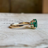 Oval-cut emerald single-stone ring