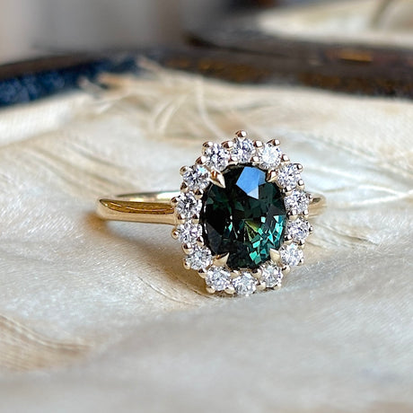 Teal sapphire & diamond cluster ring