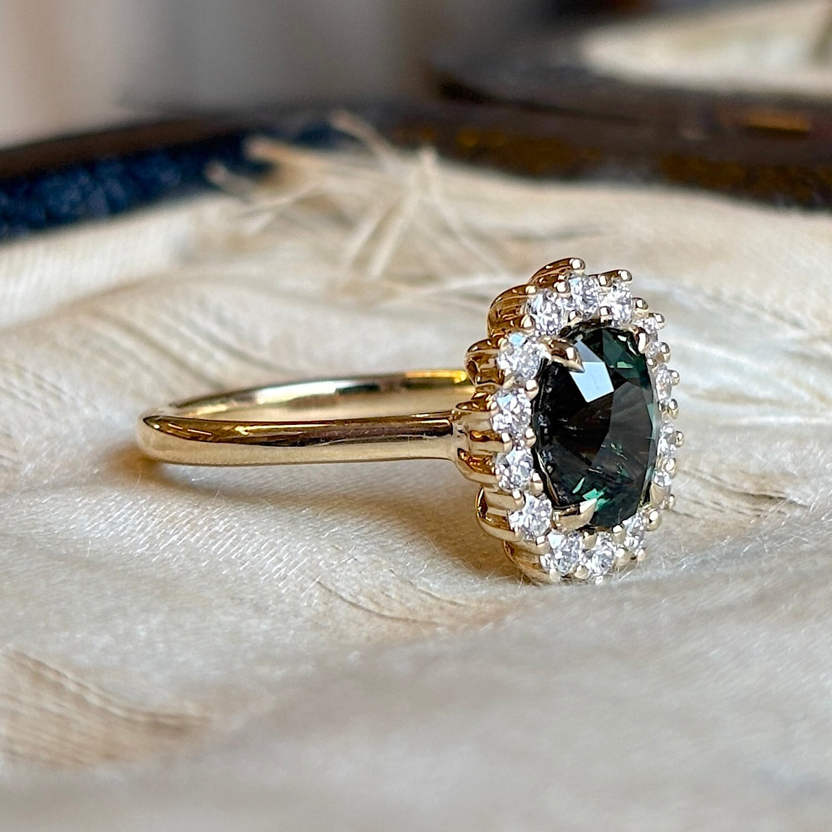 Teal sapphire & diamond cluster ring