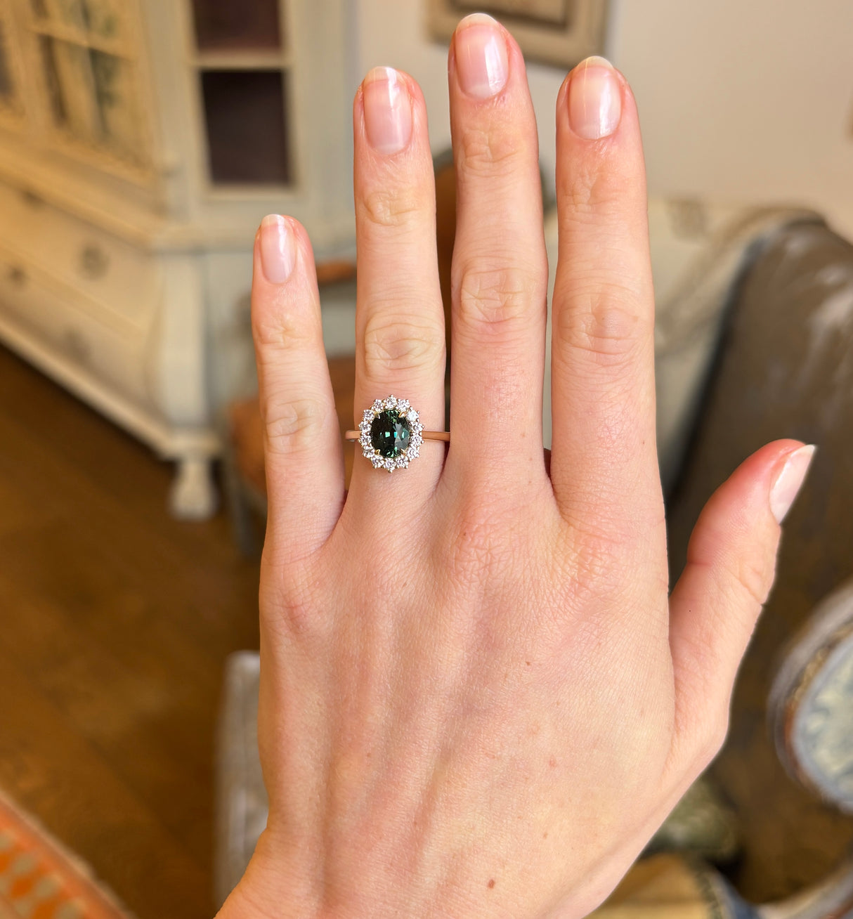 Teal sapphire & diamond cluster ring