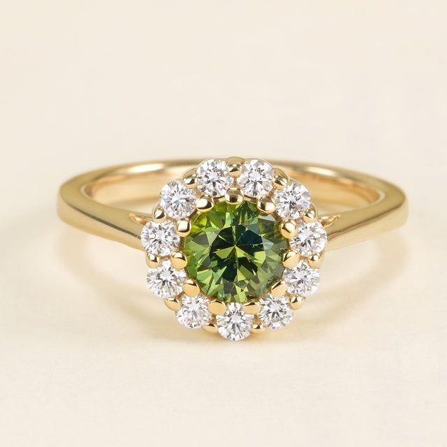 Green sapphire & diamond cluster engagement ring