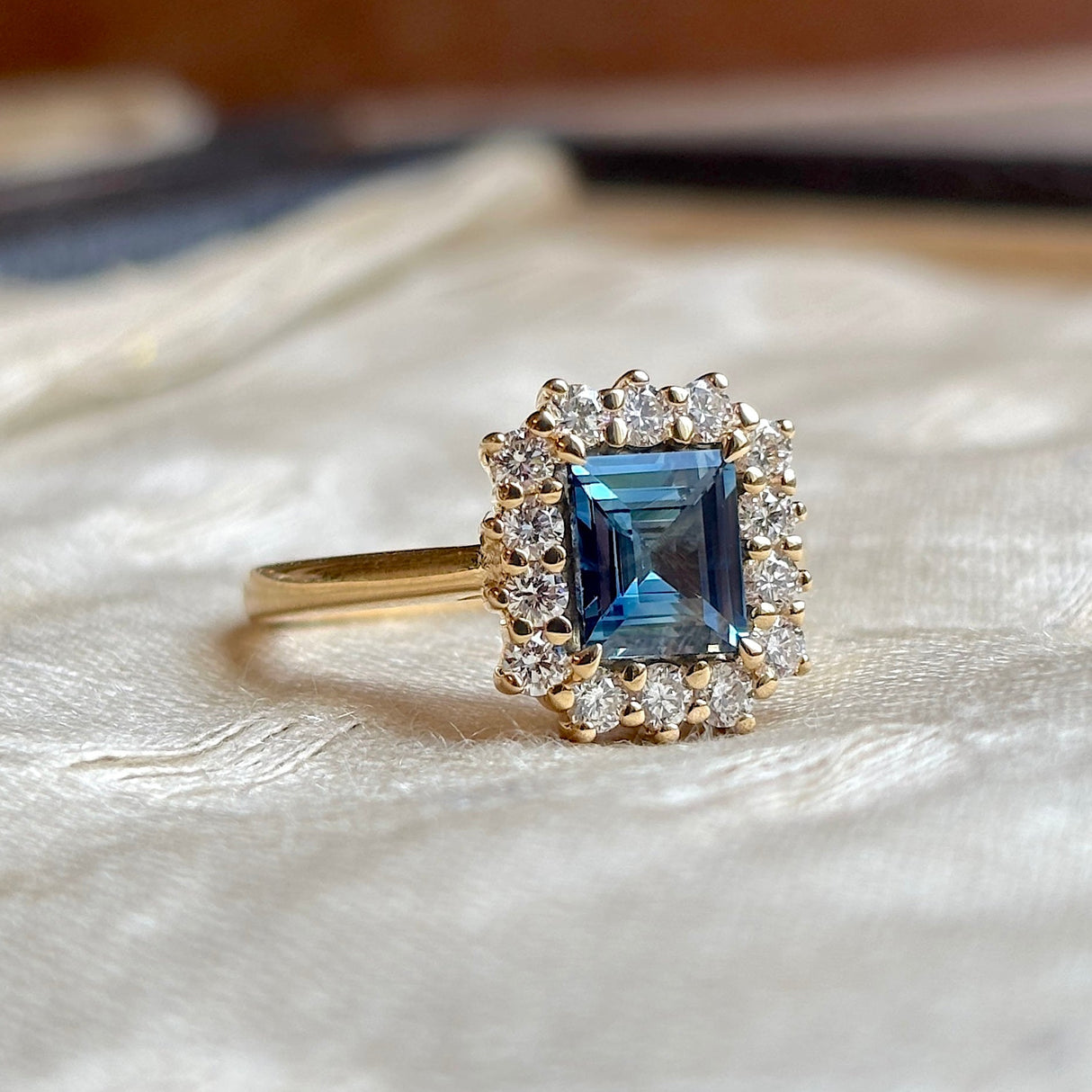 Baguette-cut teal sapphire & diamond cluster ring