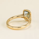 Emerald-cut teal sapphire single-stone ring